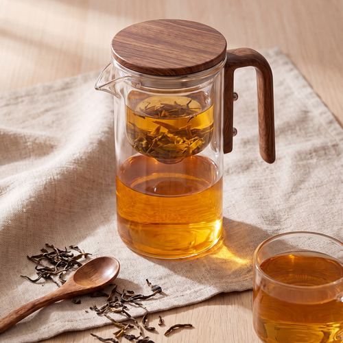Loose tea leaves steeping in the infuser